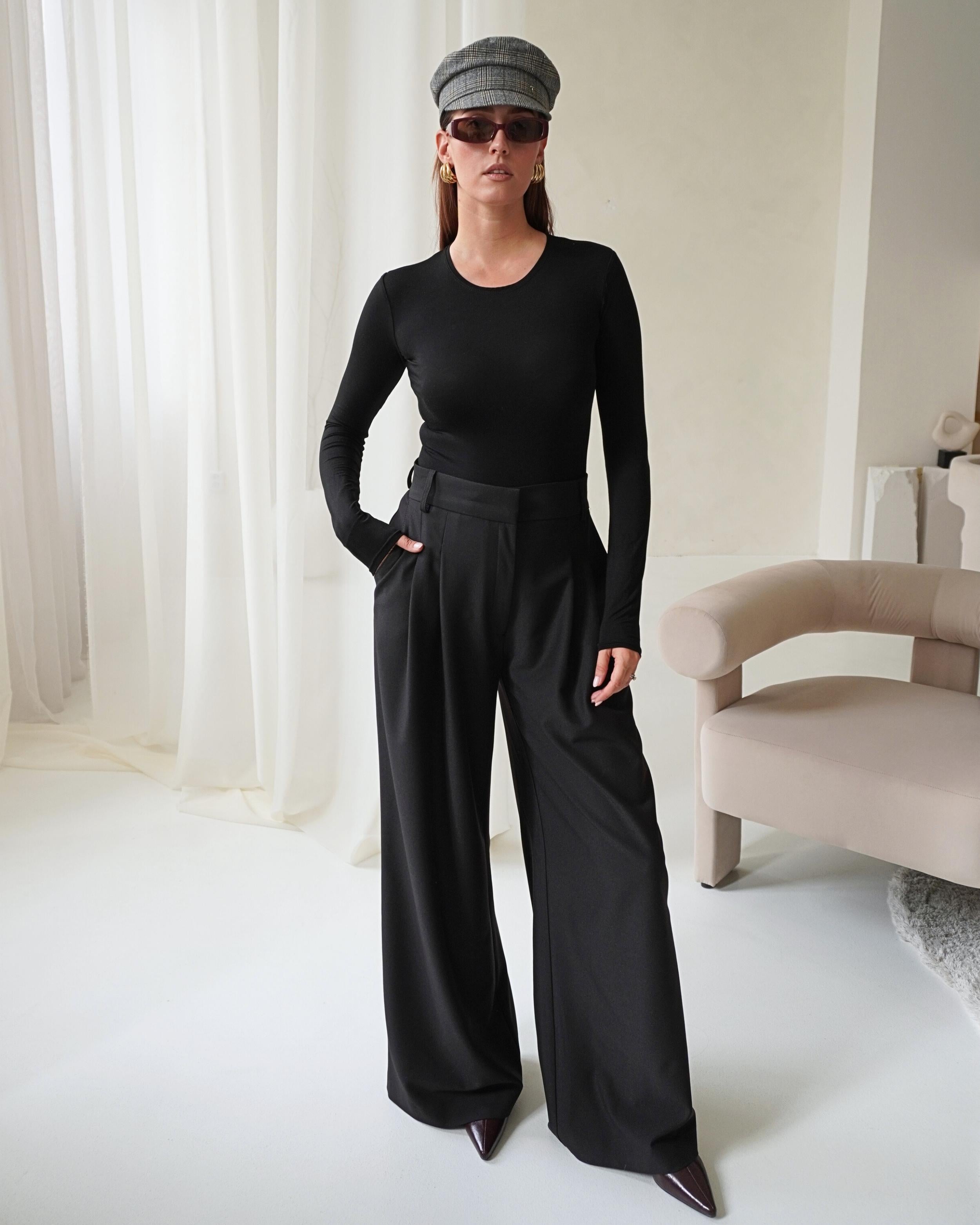 THÉFI Longsleeve styled with trousers for everyday elegance.