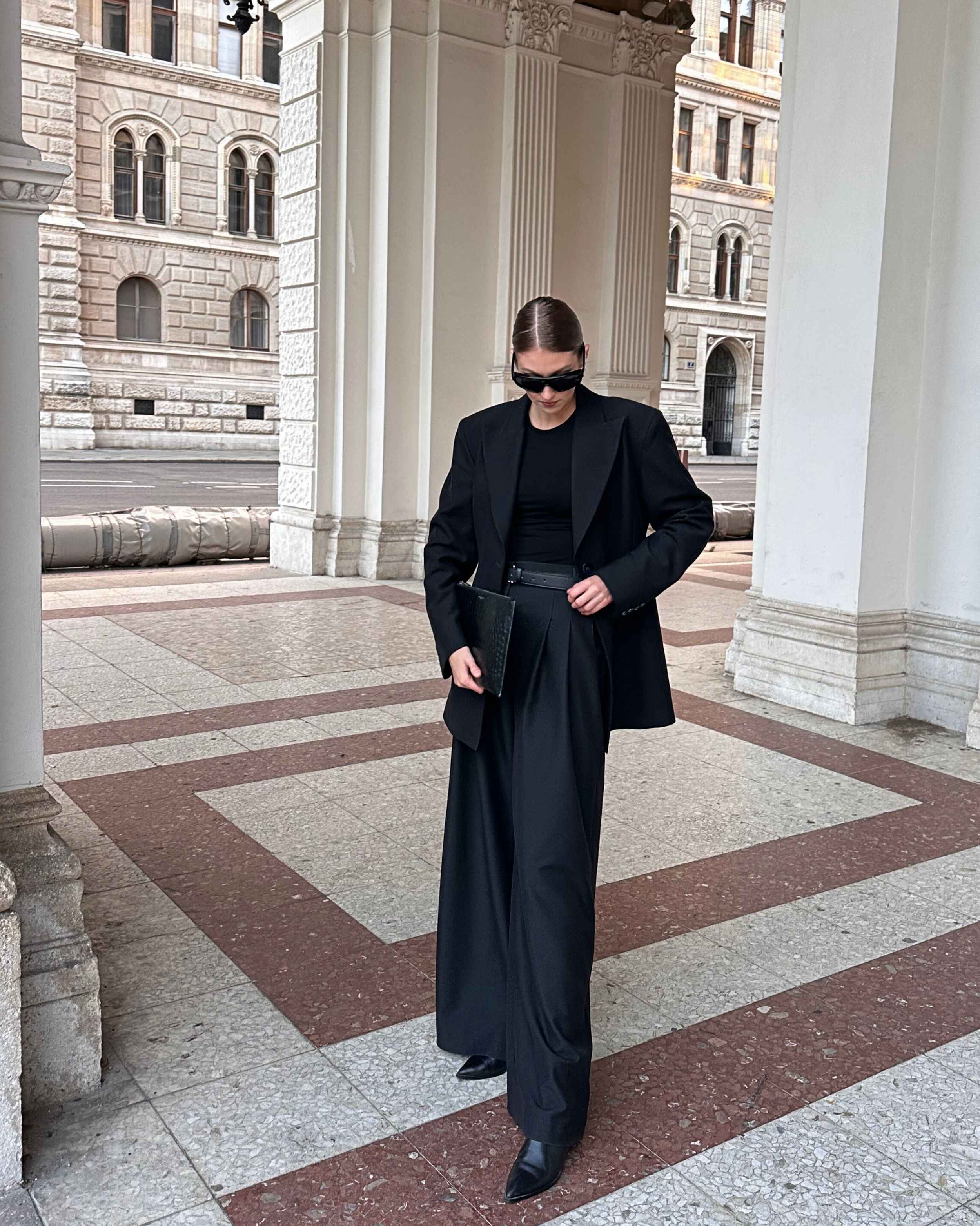 Model wearing THÉFI Essential waist-shaping long-sleeve top.