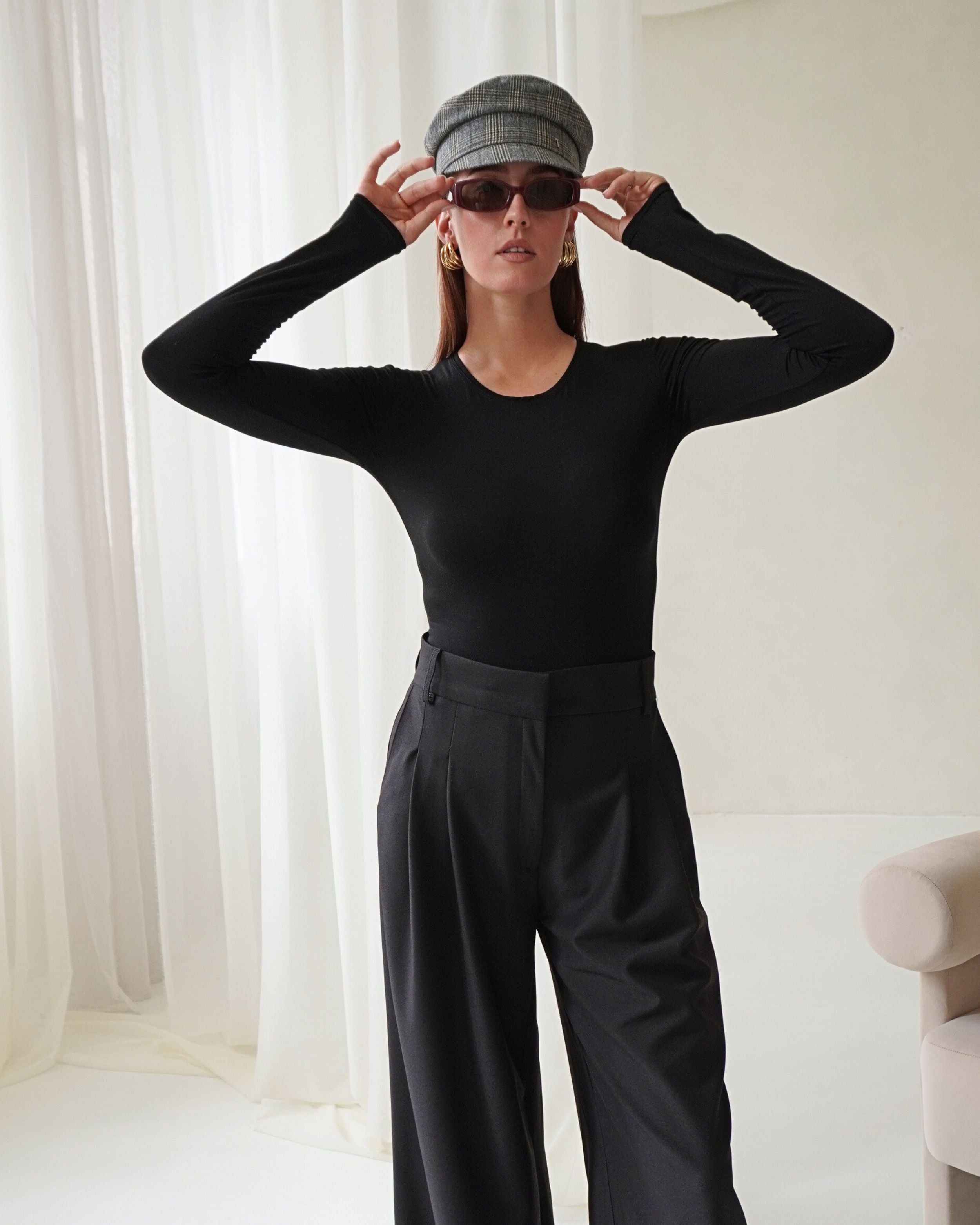 THÉFI Longsleeve styled with trousers for everyday elegance.