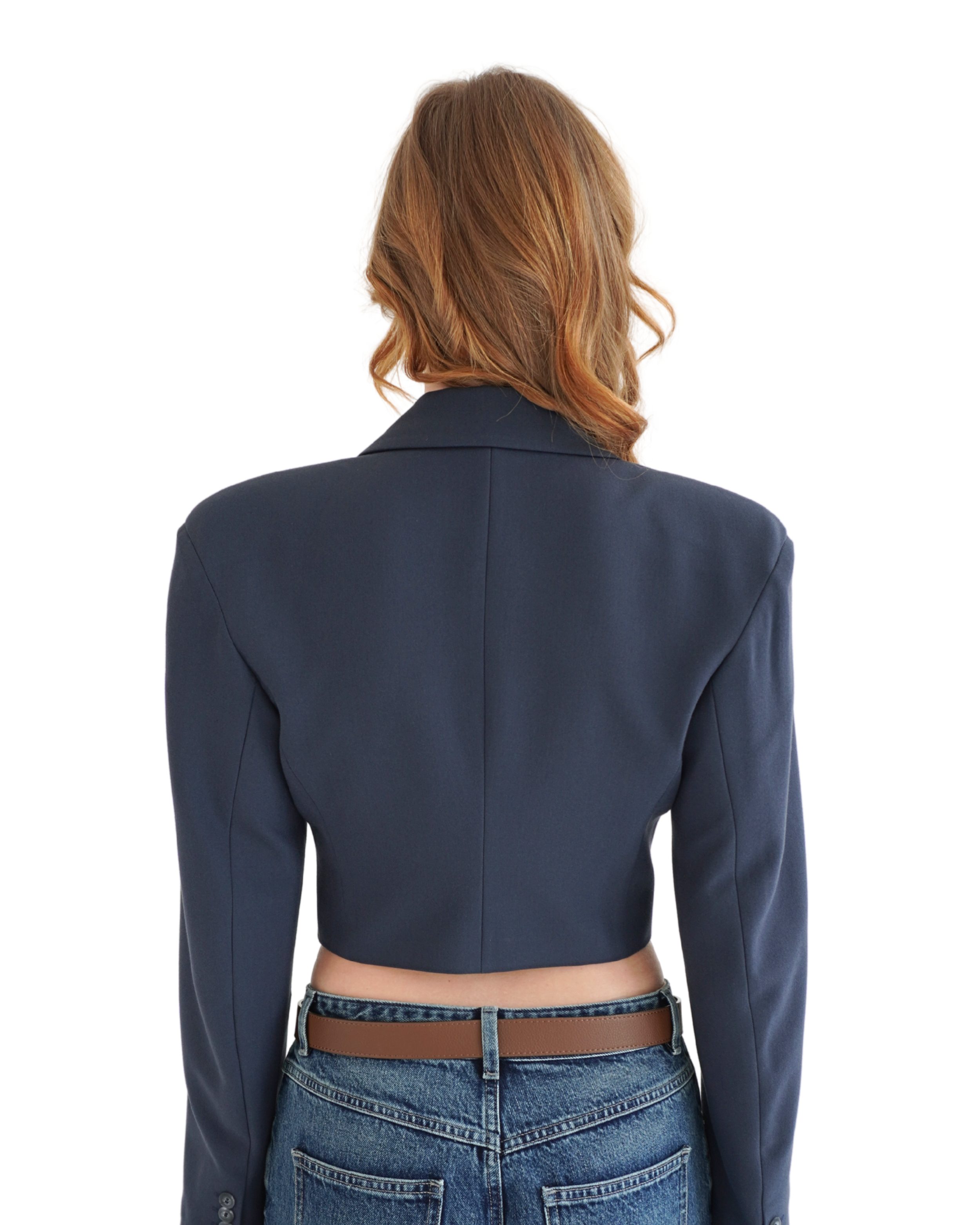 Back view of navy crop blazer THÉFI showcasing clean tailoring and fitted silhouette
