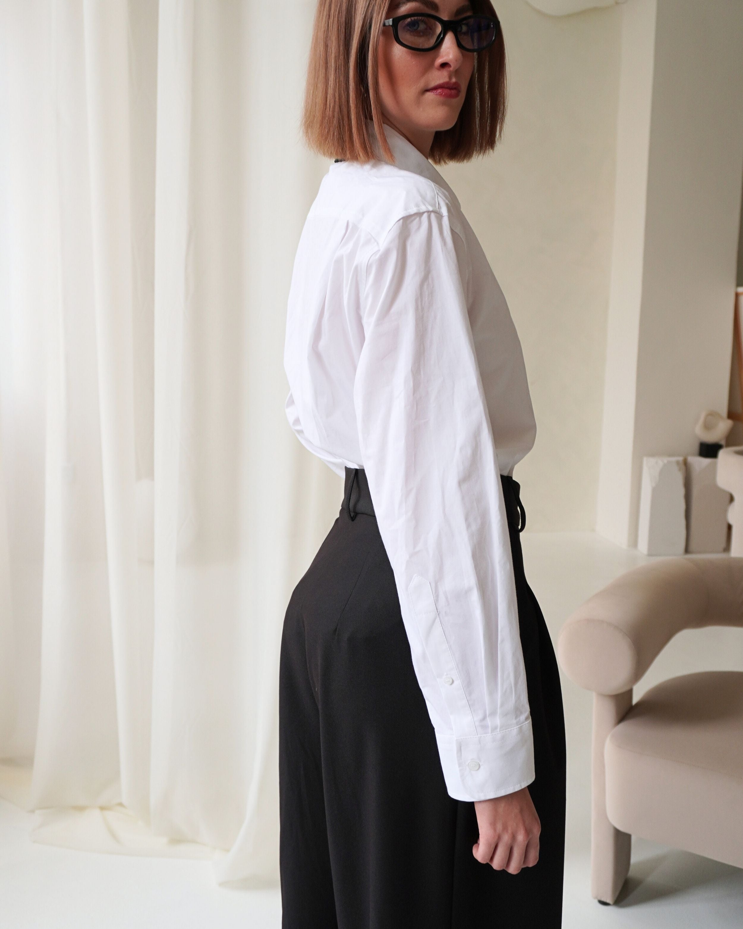 Detail of high-waist tailored Dione trousers