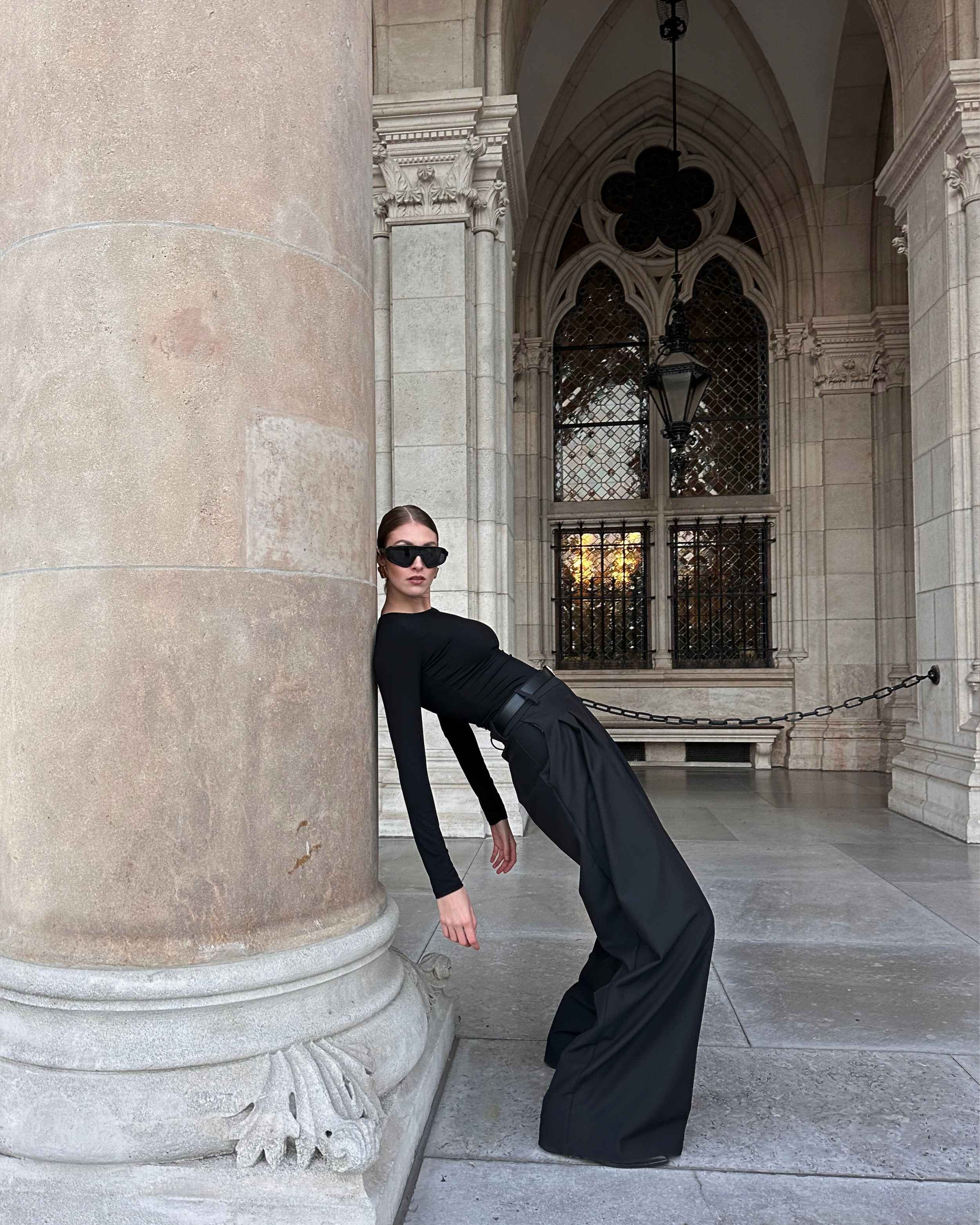 Model wearing THÉFI Essential waist-shaping long-sleeve top in vogue pose.