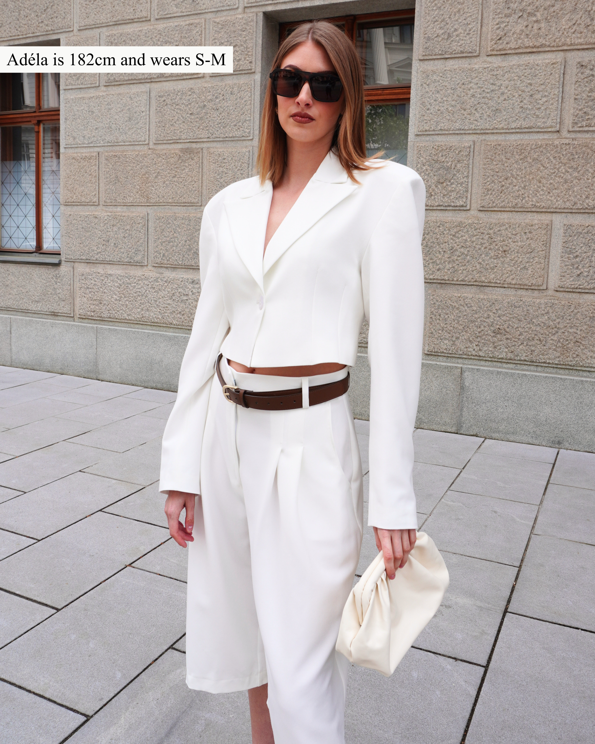 Cream crop blazer THÉFI styled in a full street style outfit for an effortless elegant look