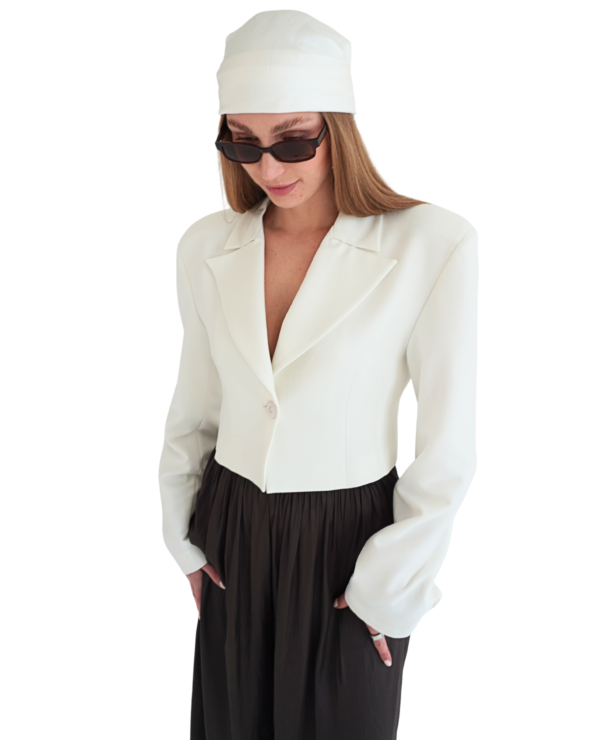 Cream crop blazer THÉFI styled with headscarf in a relaxed fashion pose
