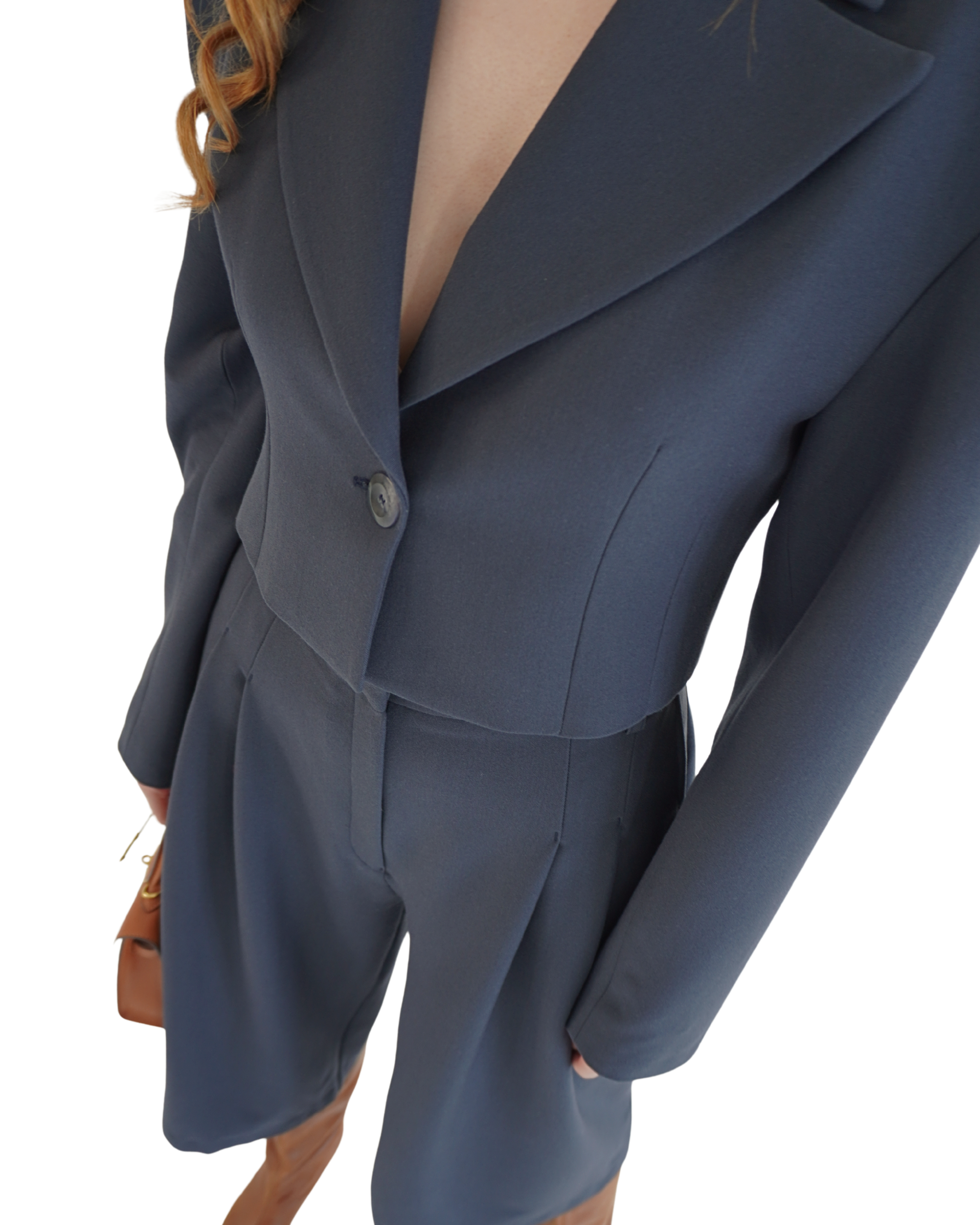 Detail of lapel on navy crop blazer THÉFI highlighting precise tailoring